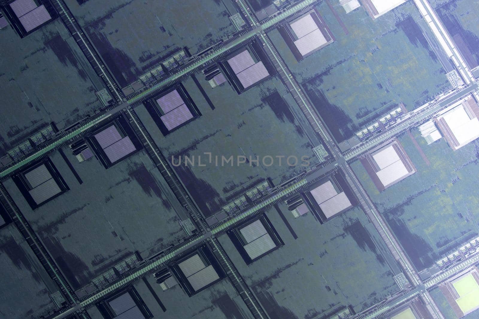 Silicon monocrystalline wafer with microchips after photolithography etching manufacturing used in fabrication of electronic integrated circuits. Full-frame high-tech macro background.