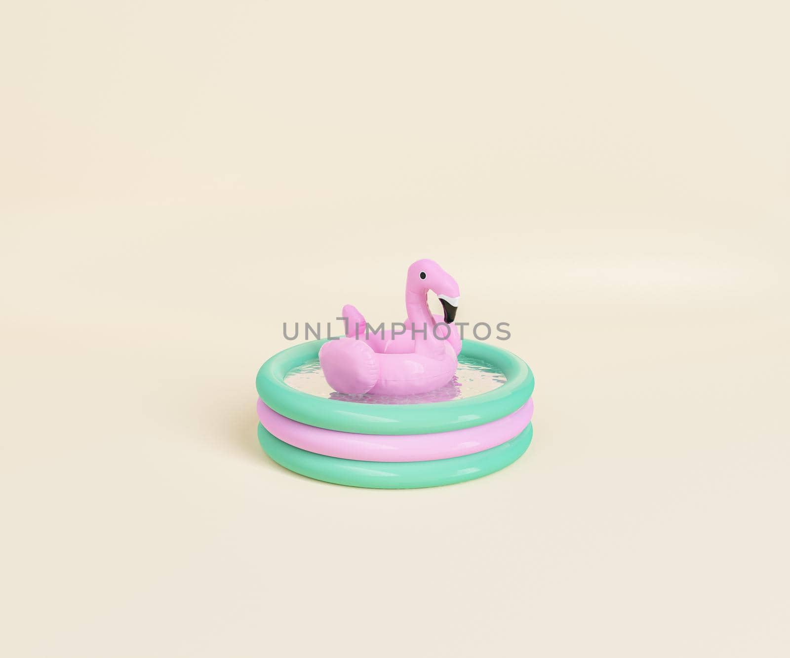 3D rendering of pink inflatable flamingo toy floating in water in small round shaped pool against beige background