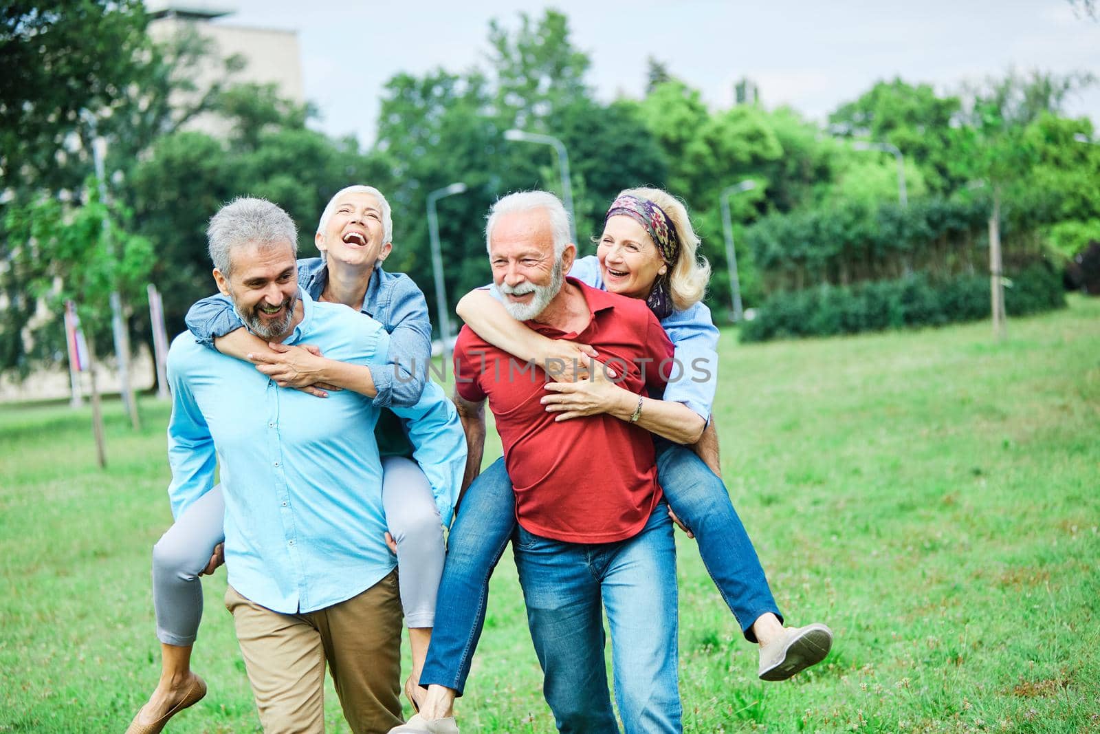 portrait of happy smiling senior couple outdoors