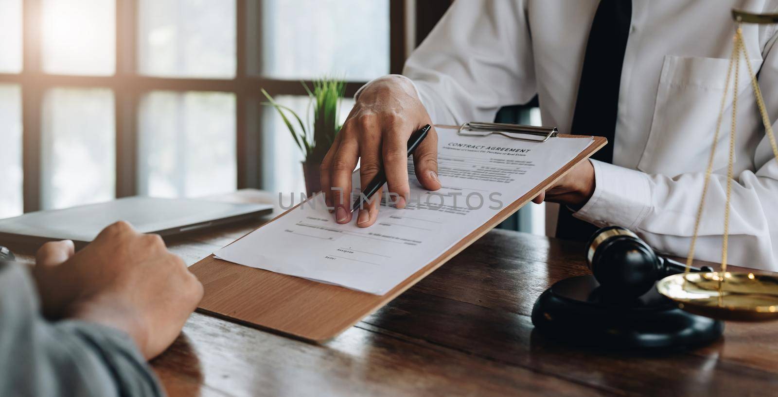 legal consultants, notary or justice lawyer discussing contract document on desk with client customer in courtroom office, business, justice law, insurance, legal service, buy and sell house concept.