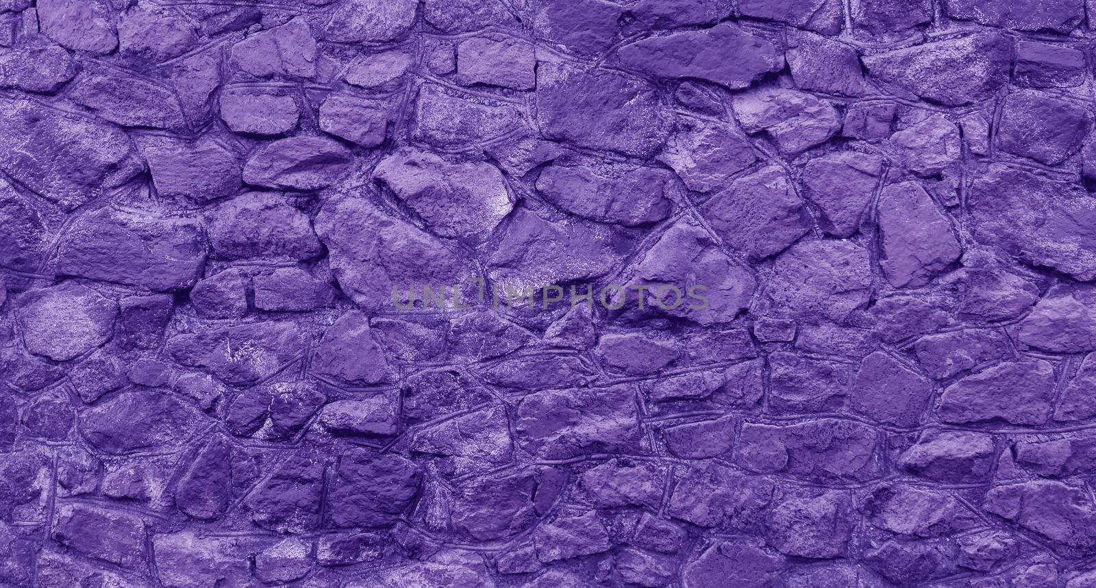 Abstract background of stones painted with purple paint. by gelog67