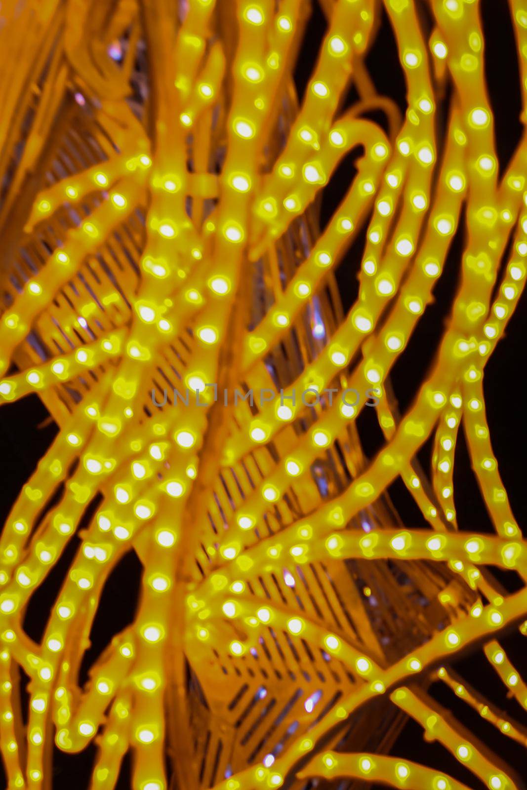 Fragment of holiday illumination with yellow photodiode lights. by gelog67