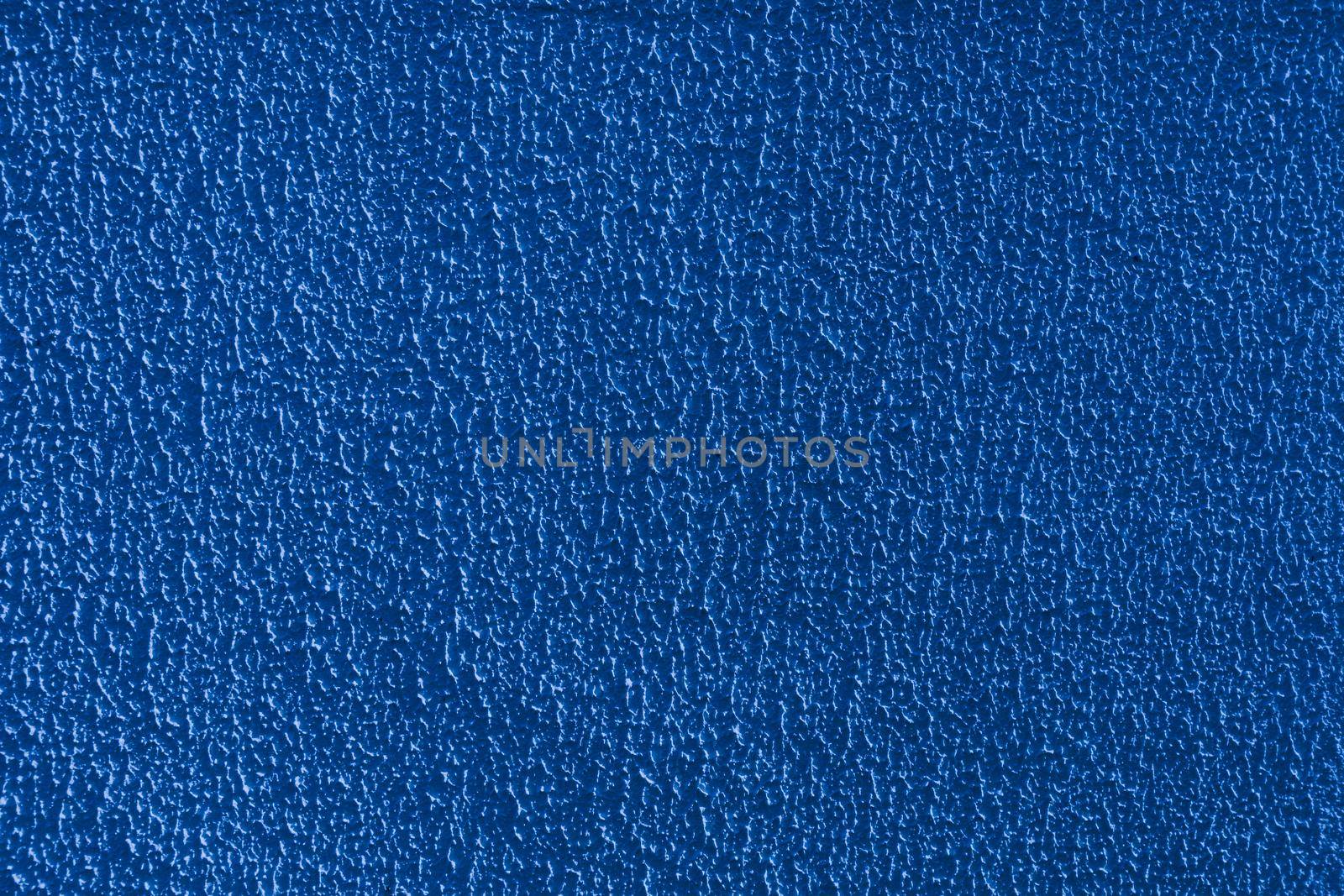 Abstract background of blue embossed rough plaster. by gelog67