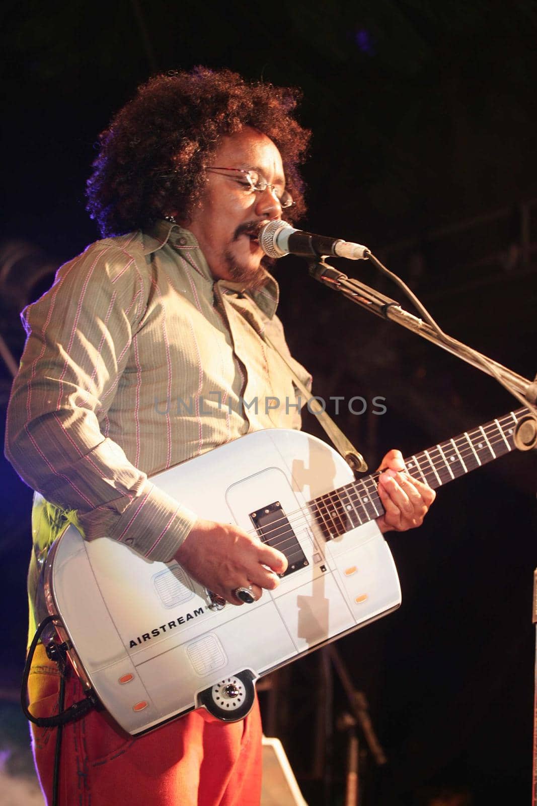 porto seguro, bahia, brazil - november 21, 2009: Singer and songwriter Chico Cesar during a show in the city of Porto Seguro.