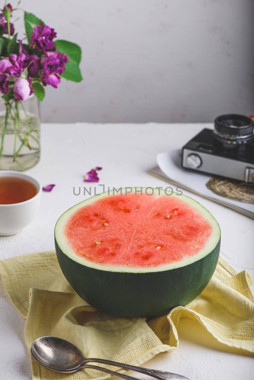 Half of Watermelon on Yellow Napkin by Seva_blsv