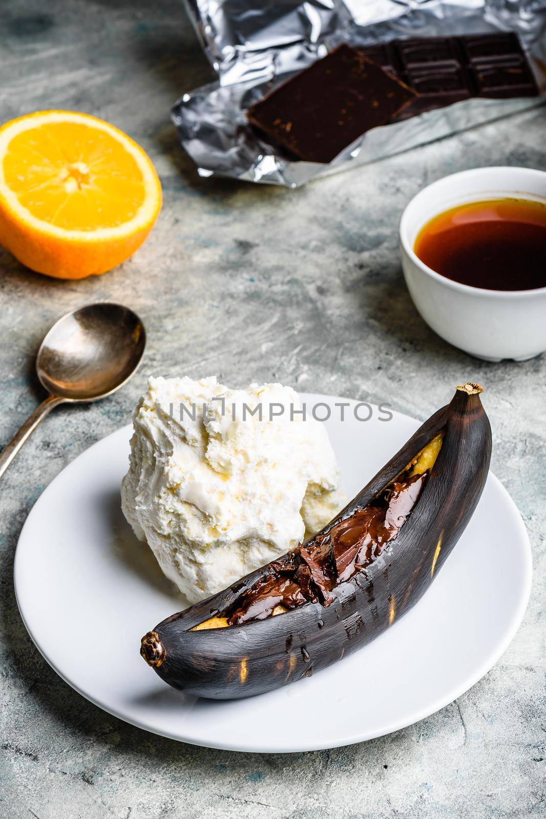 Grilled banana with dark chocolate and vanilla ice cream. by Seva_blsv