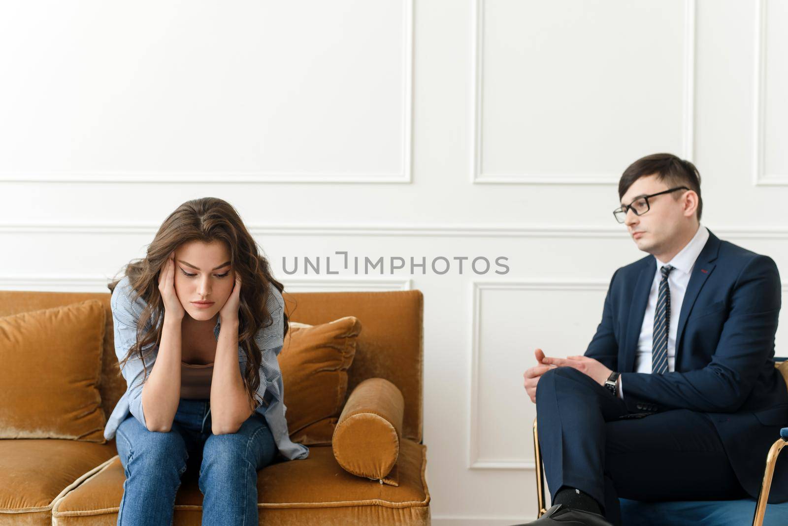 A young worried woman visits a counseling therapist. The girl feels depressed, unhappy and hopeless, needs help. Unwanted pregnancy, abortion or death of a loved one, drug addiction by etonastenka