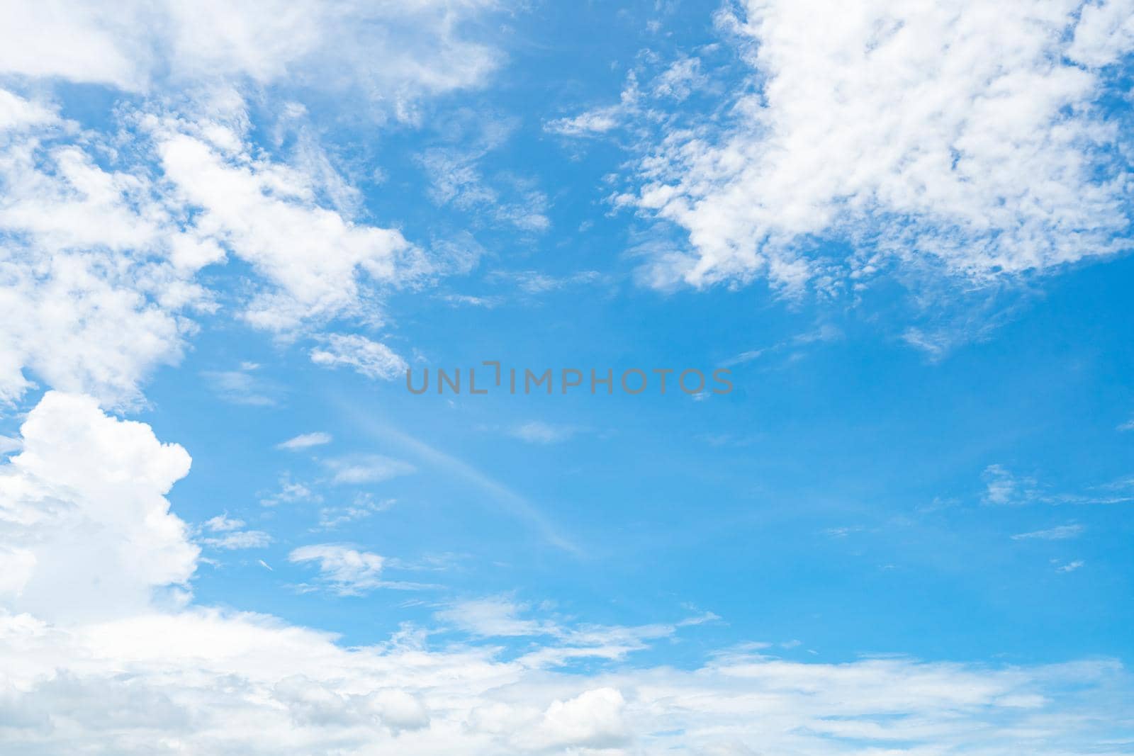 Beautiful blue sky and white clouds abstract background. Cloudscape background. Blue sky and fluffy white clouds on sunny day. Nature weather. Beautiful blue sky for happy day background. Summer sky.