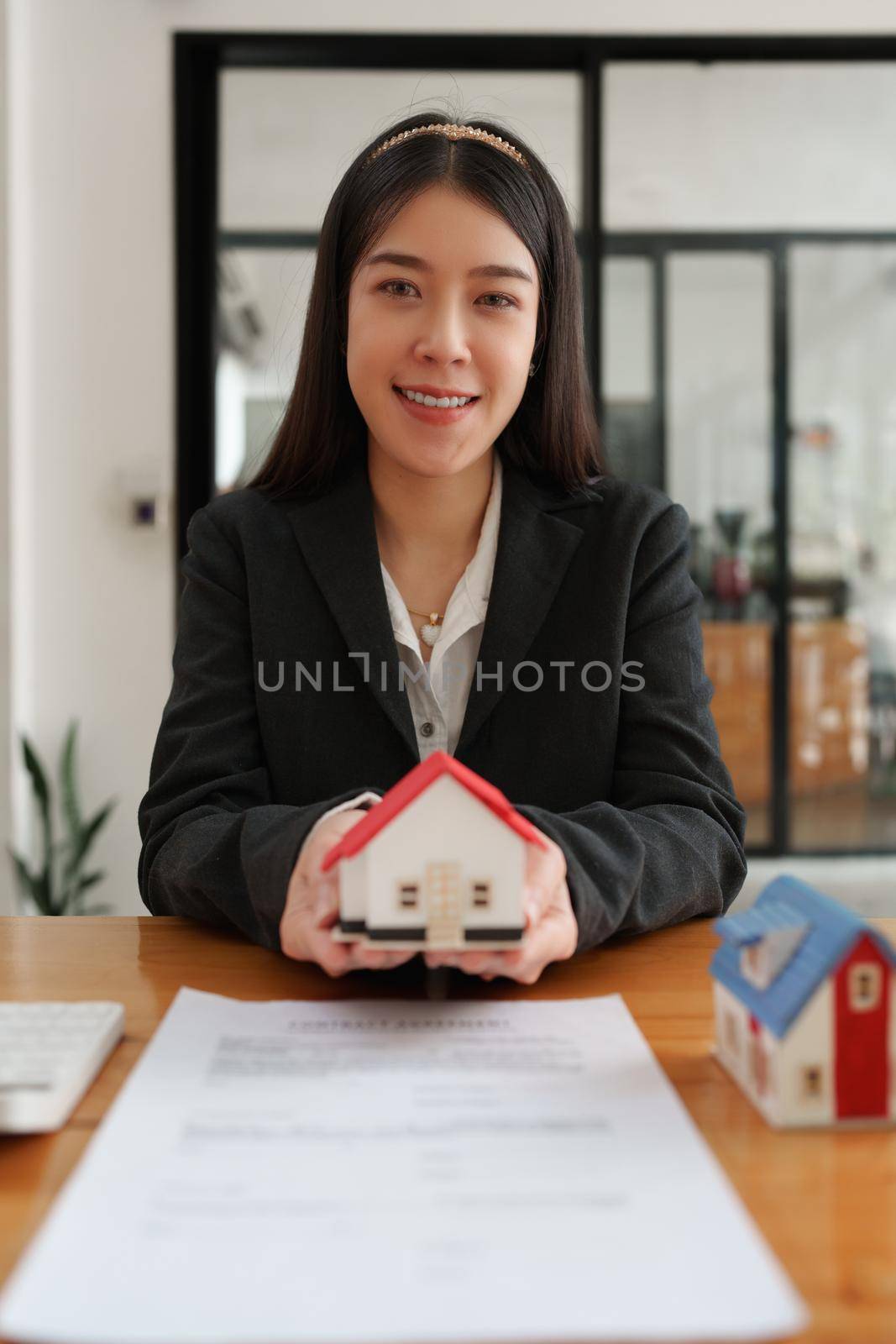 Real estate concept. Business woman sign in agreement contract