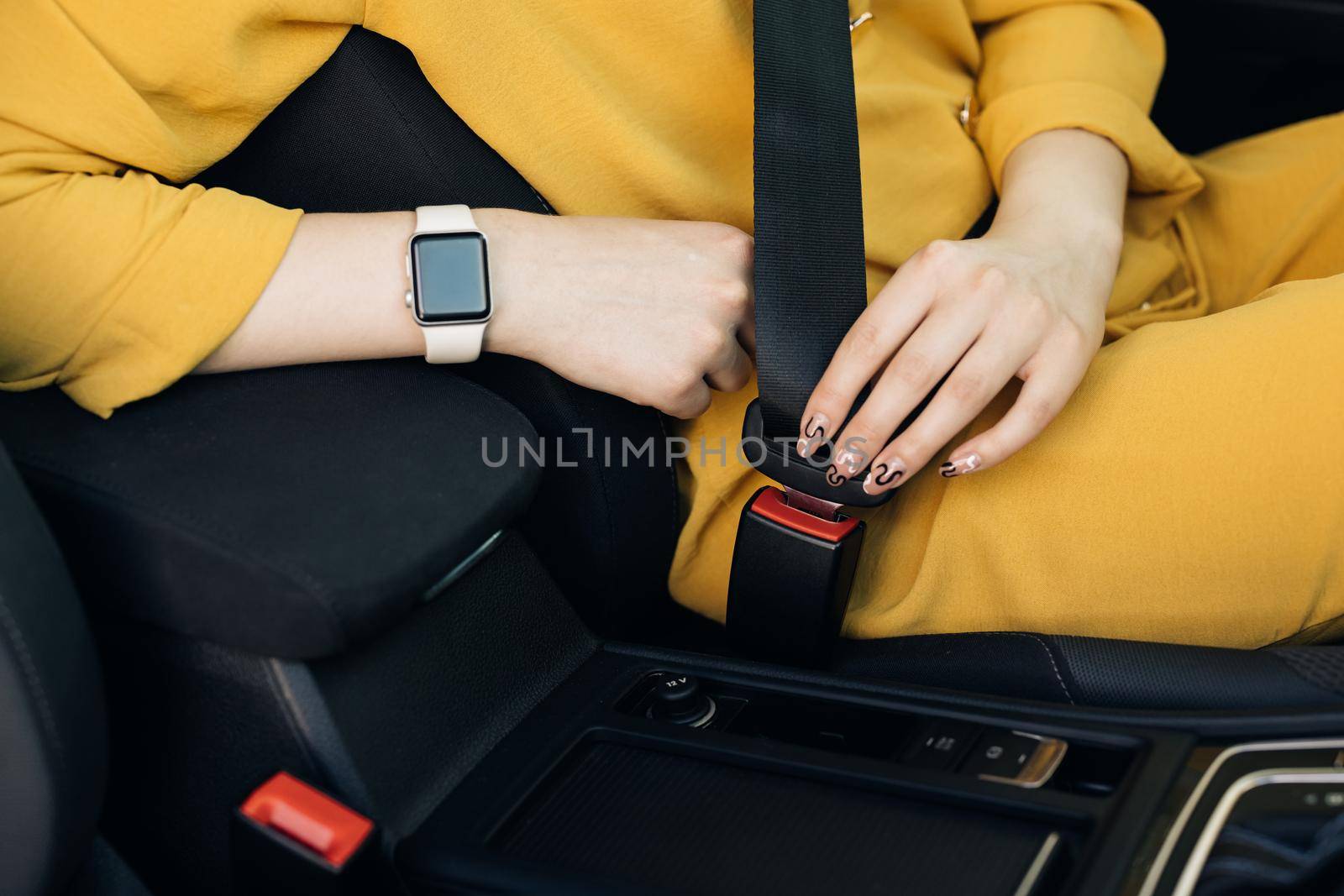Buckle up seat belt in a car. Woman Hand Fastening Car Safety Seat Belt. Protection Road Safety Snap. Driver Fastening Seatbelt In Car. Woman Car Lap Buckling Inside Vehicle Before Driving by uflypro