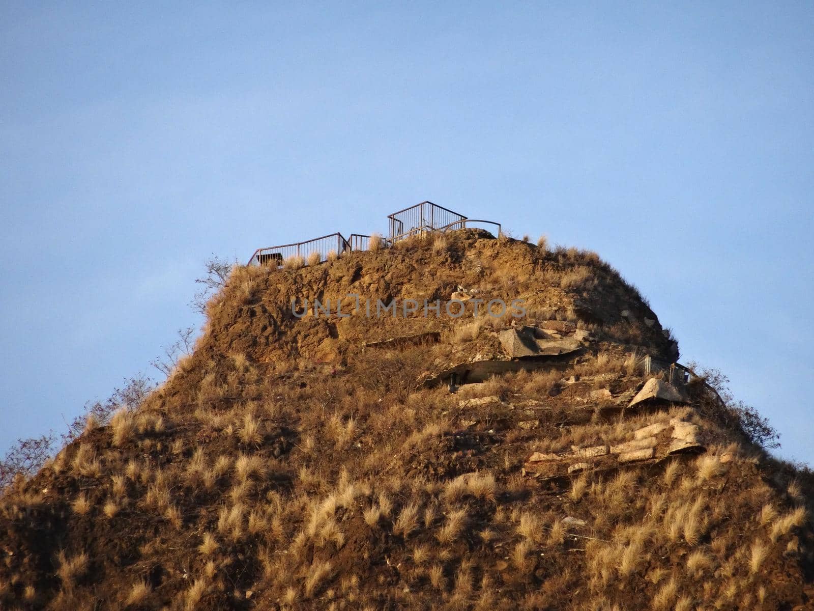 Empty Diamond Head Crater Lookout Peak with blue sky on Oahu, Hawaii.