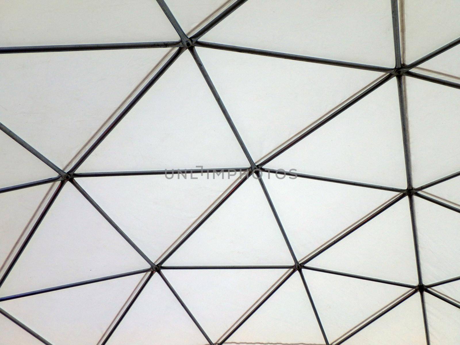 Modern Metal building dome interior with white roof.