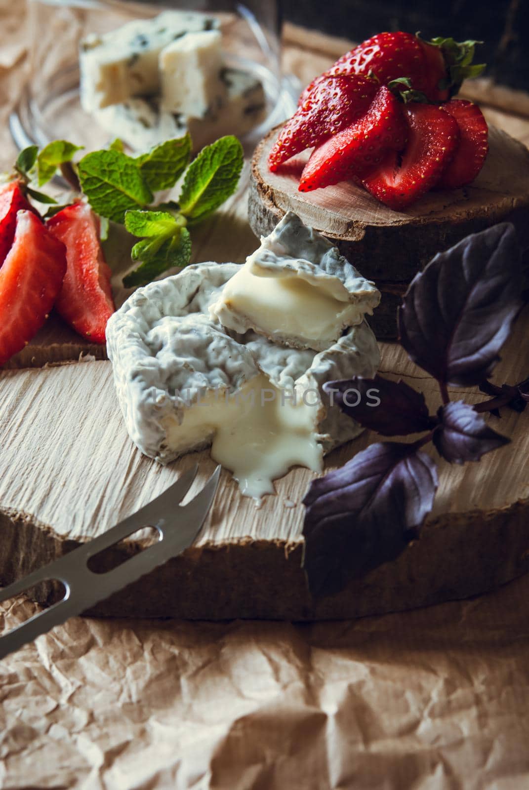 gourmet goat cheese with mold and soft liquid core . High quality photo