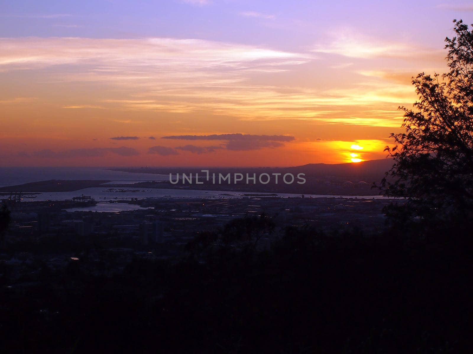 Sunset over Waianae Mountains of Oahu by EricGBVD