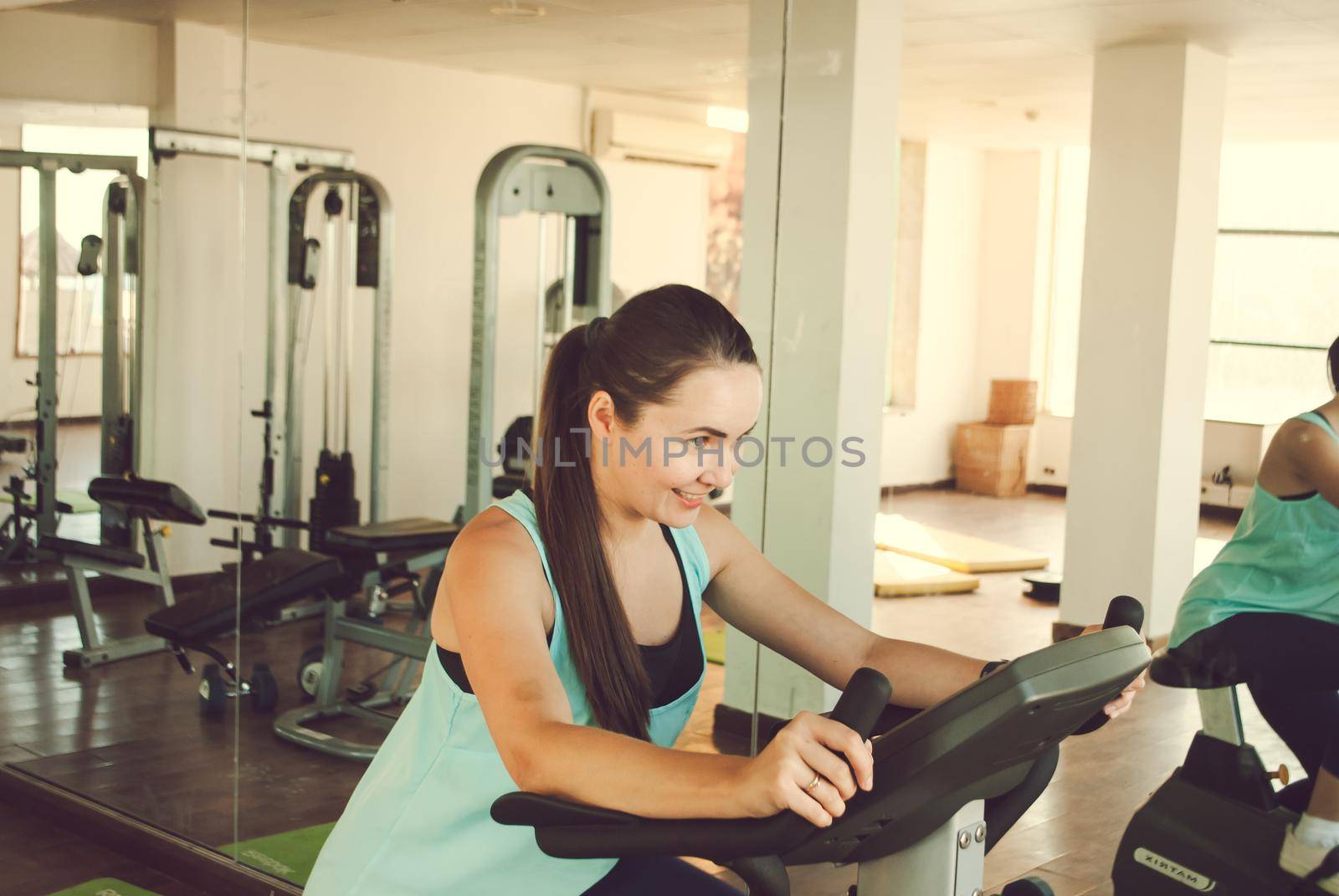 young woman training in the gym. High quality photo