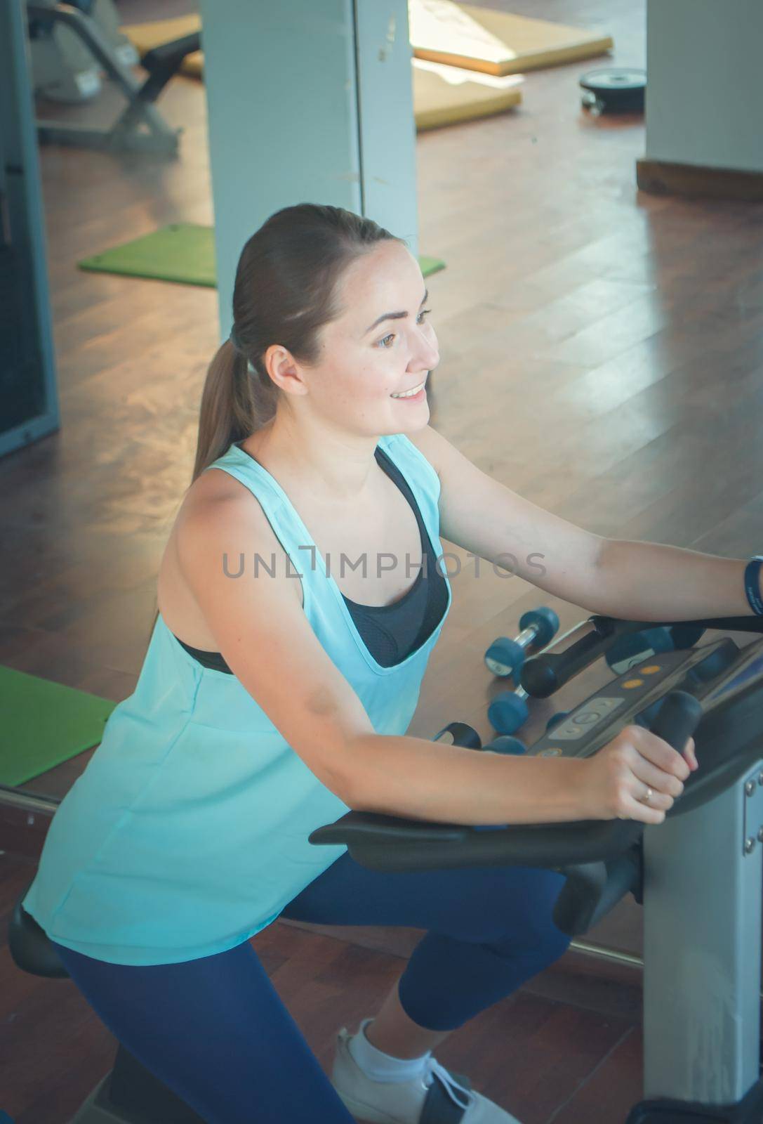 young woman training in the gym. High quality photo