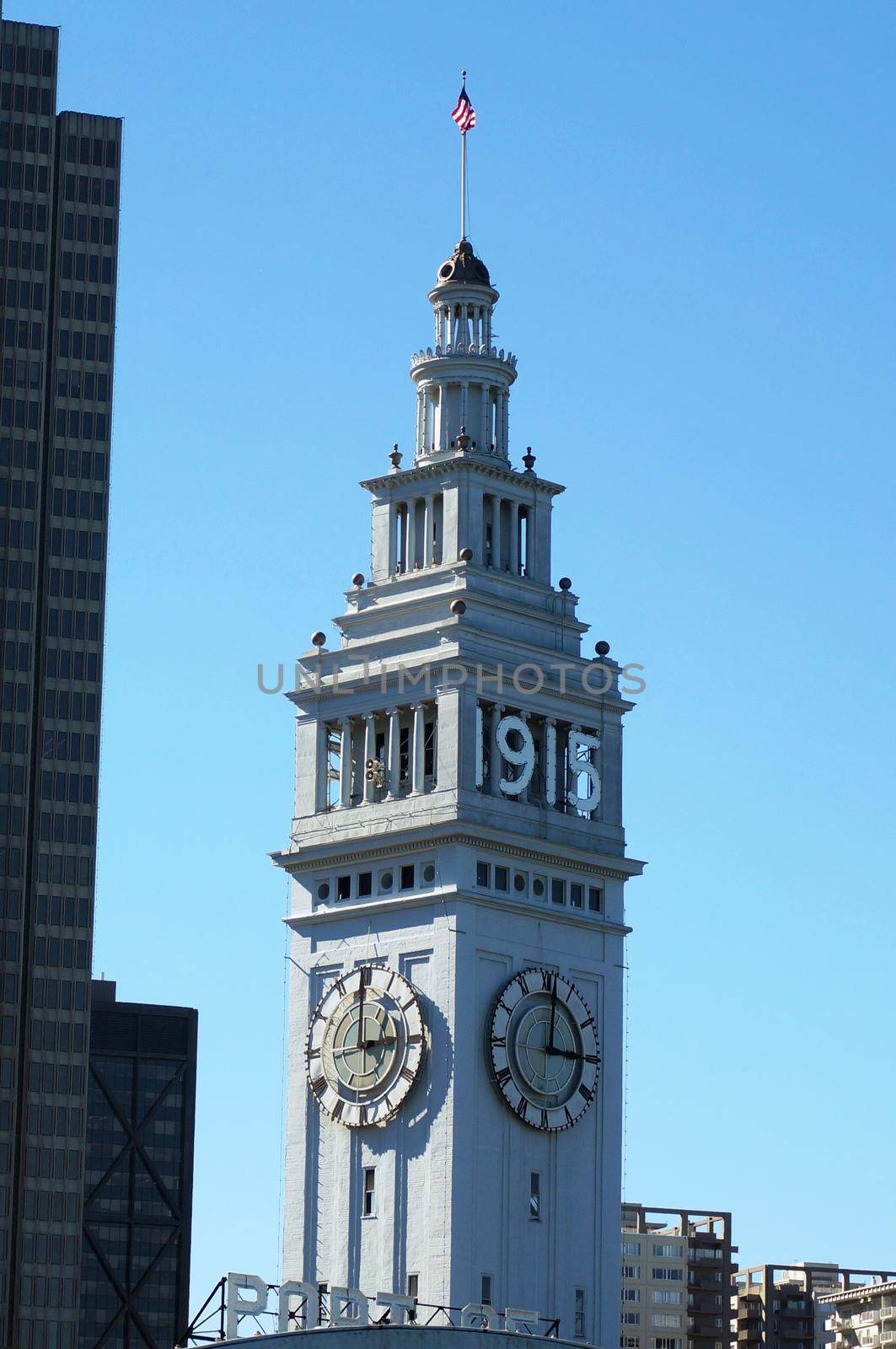 SAN FRANCISCO - OCTOBER 11:  San Francisco's waterfront landmark - the Ferry Building Clock Tower with 1915 on side marking anniversary in California on October 11, 2015.