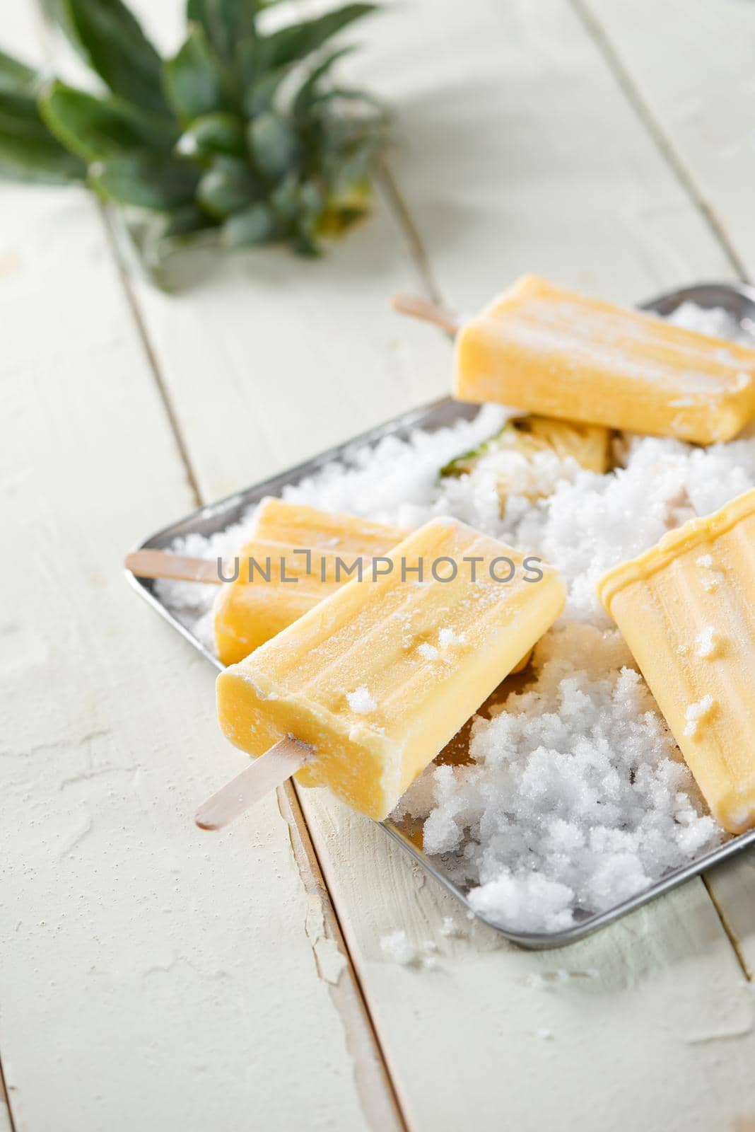 Delicious Homemade Pineapple Popsicles on Ice Cubes  by makidotvn