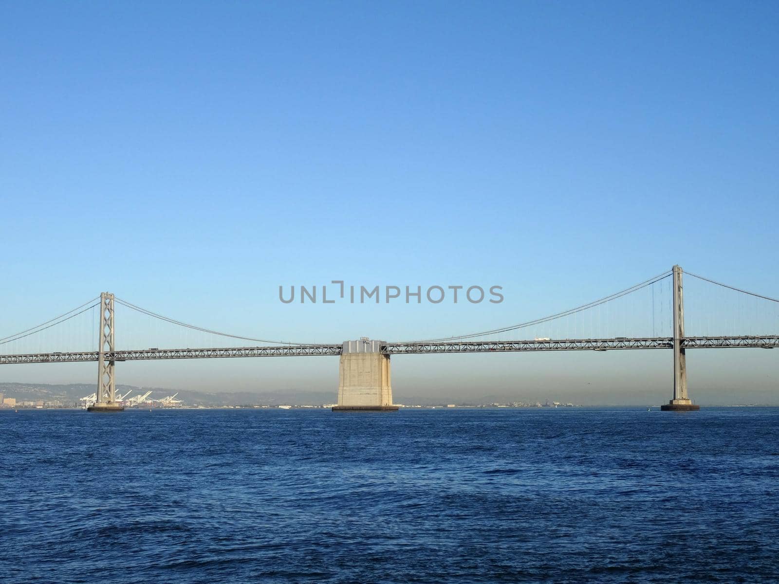 San Francisco side of Bay Bridge with Oakland in the distance on a clear day.  October 2015.