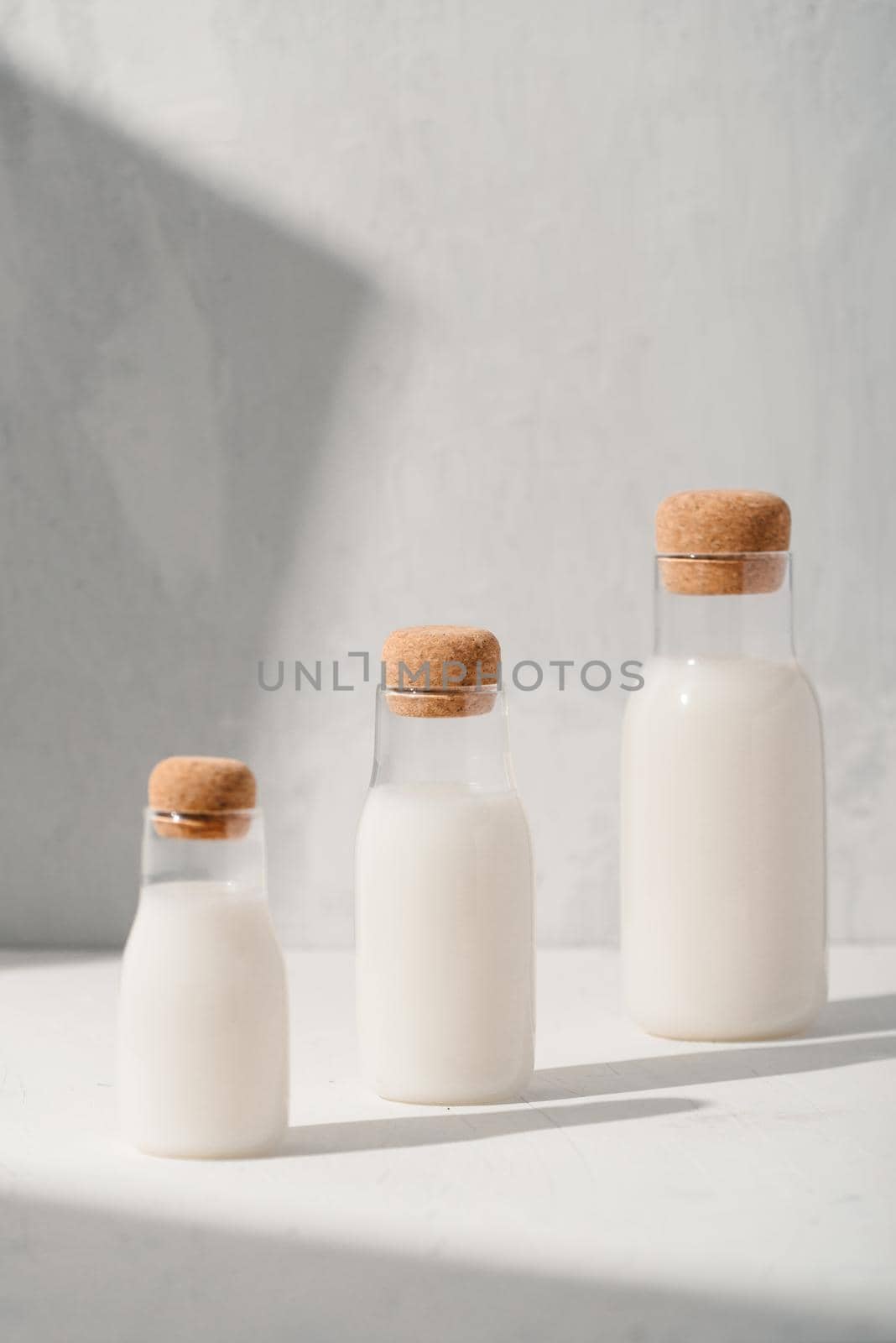 Milk or cocktail creative concept, minimalism styled, angle view, space for a text.
