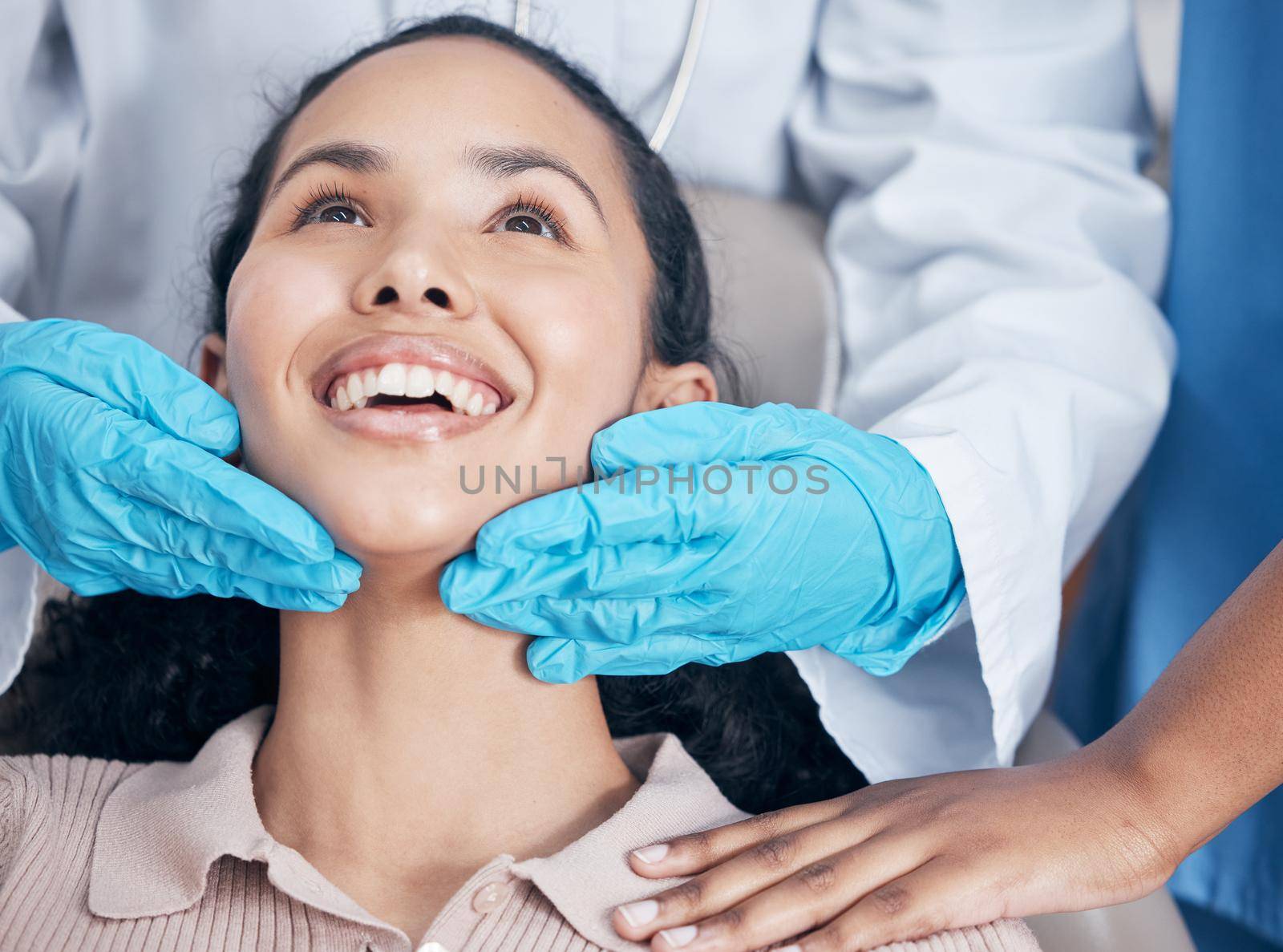 a dentist checking their handiwork after a procedure.