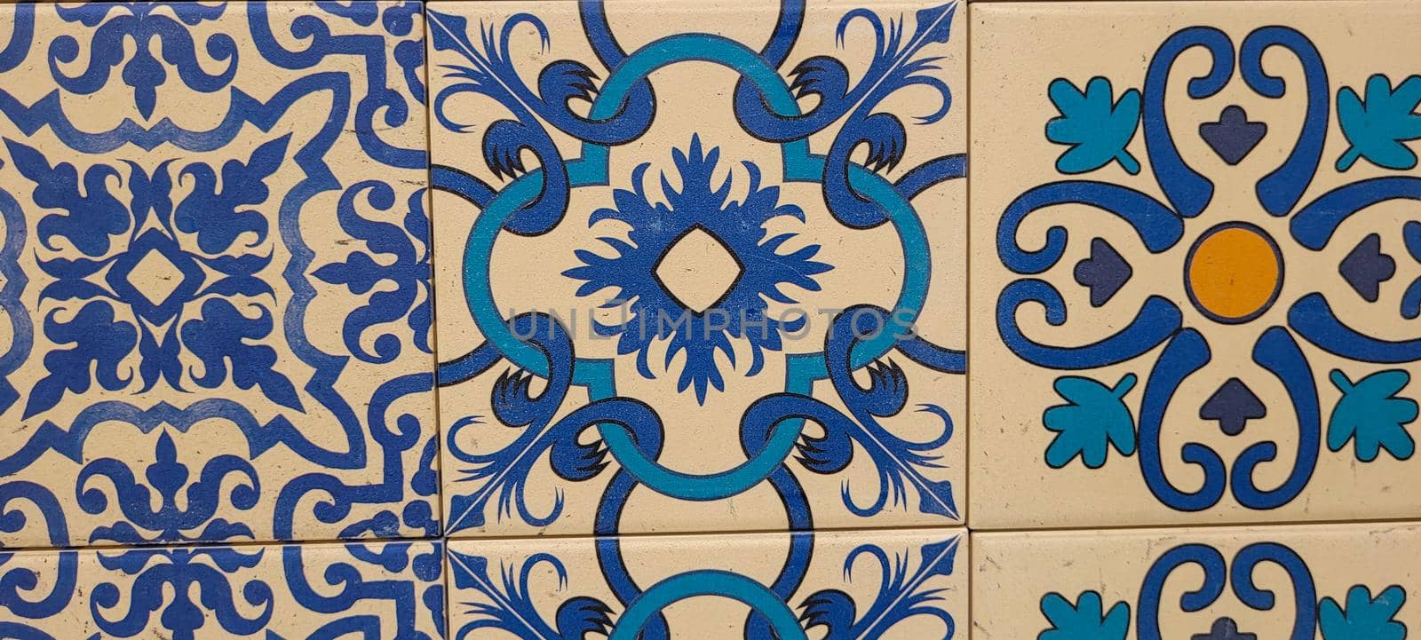 blue and white portuguese tile with drawings by sarsa