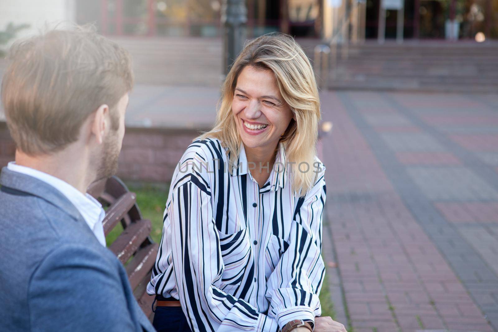 Business colleagues meeting outdoors by MAD_Production