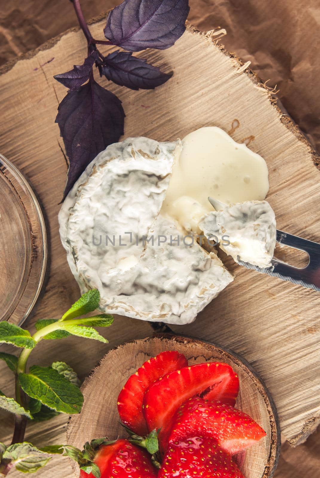 gourmet goat cheese with mold and soft liquid core . High quality photo