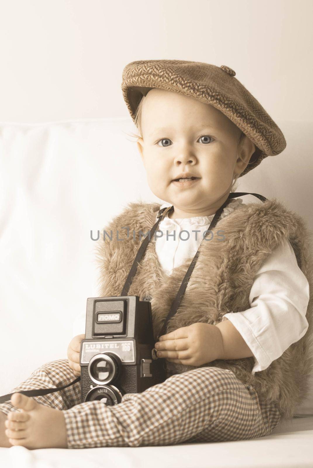 Cute baby with retro camera by maramorosz