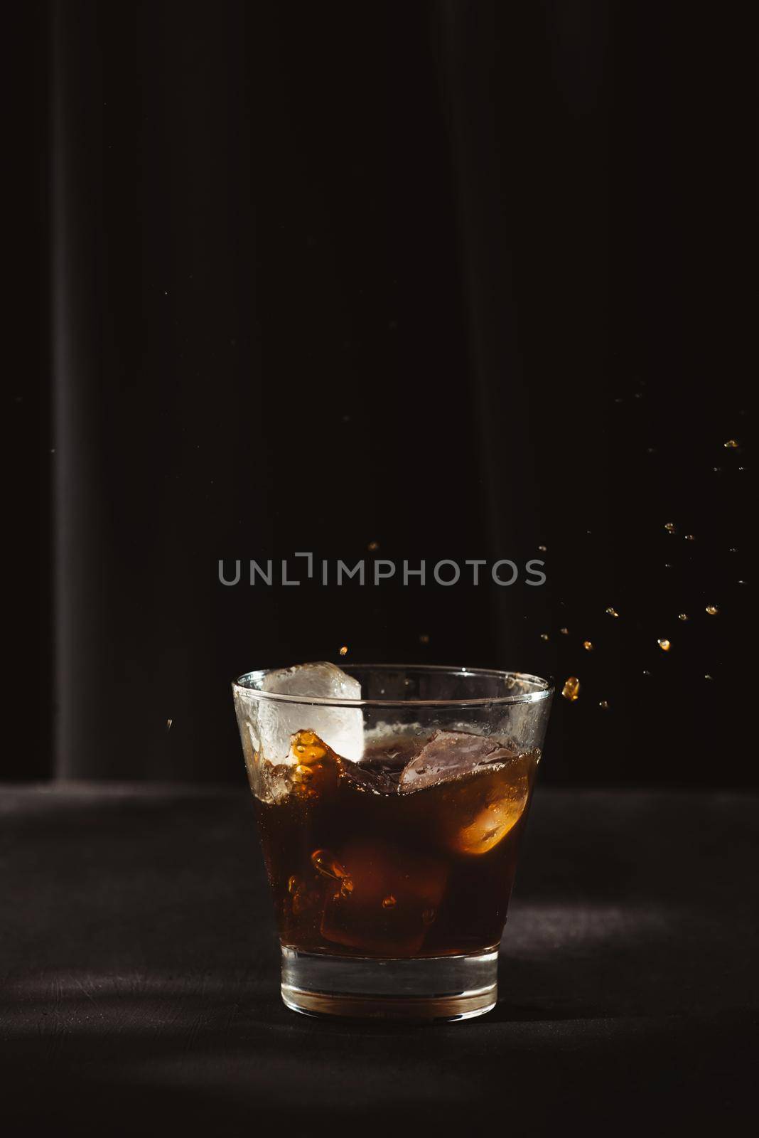 Iced coffee or cold brew coffee in a glass by makidotvn