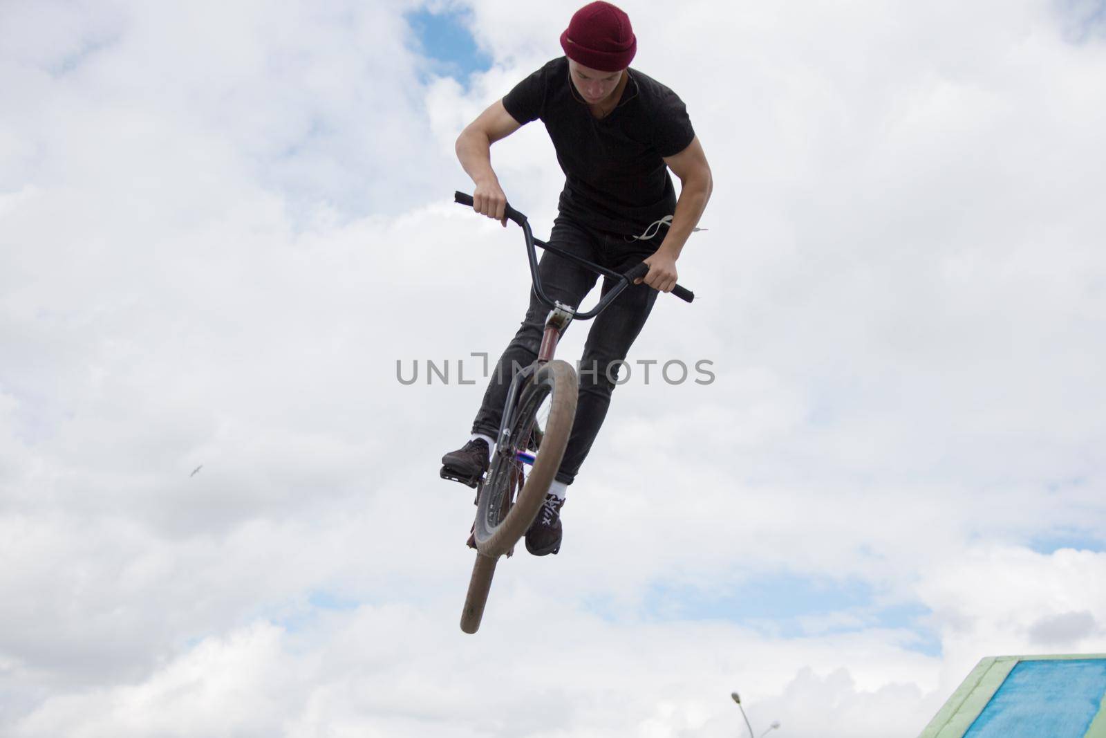 Belarus, Gomel, June 24, 2018. Central park. Extreme cycling.Dangerous tricks on an extreme bike