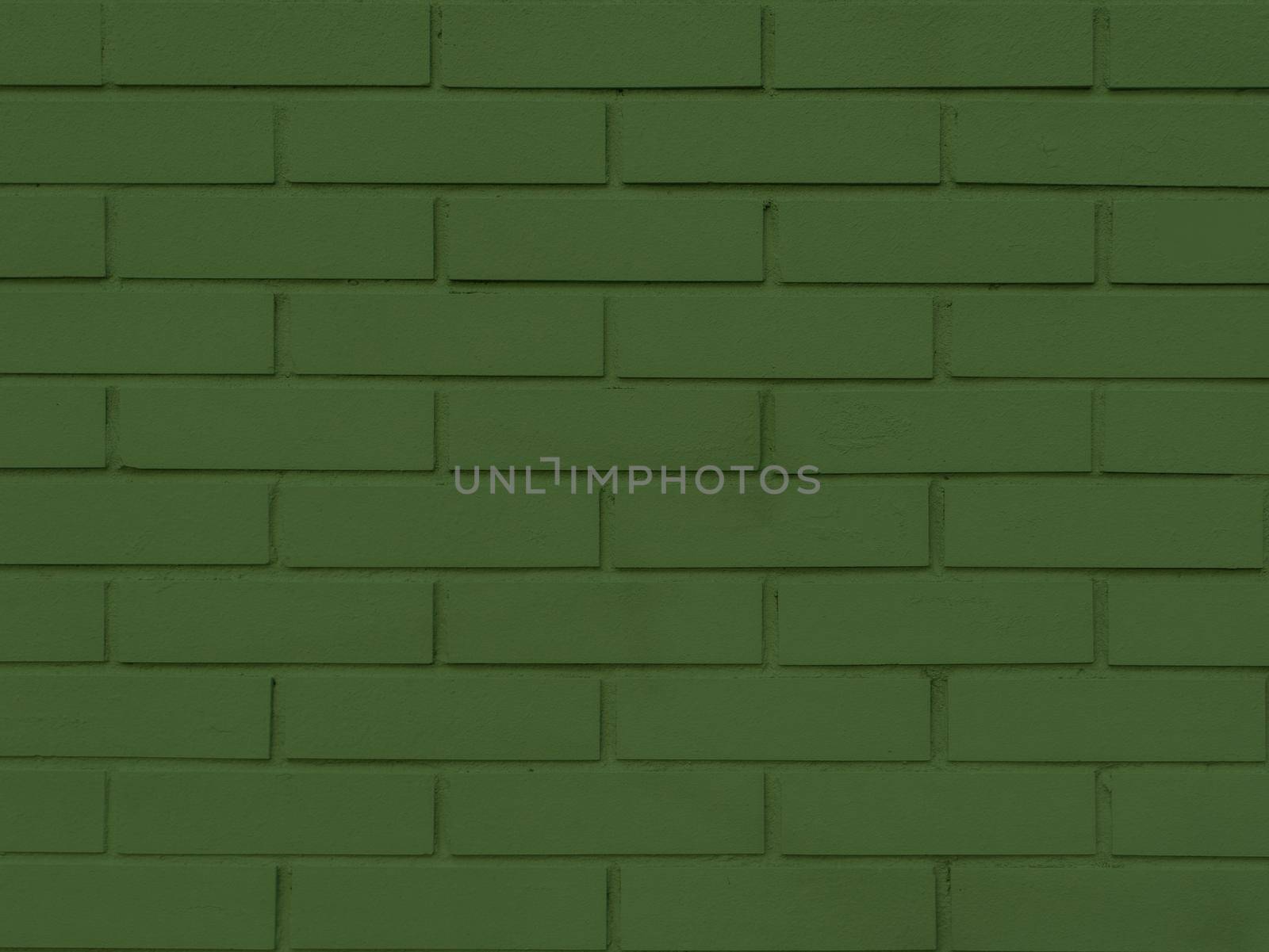 Green brick wall abstract texture background.