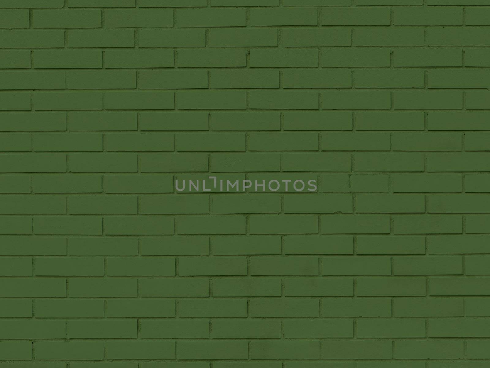 Green brick wall abstract texture background.