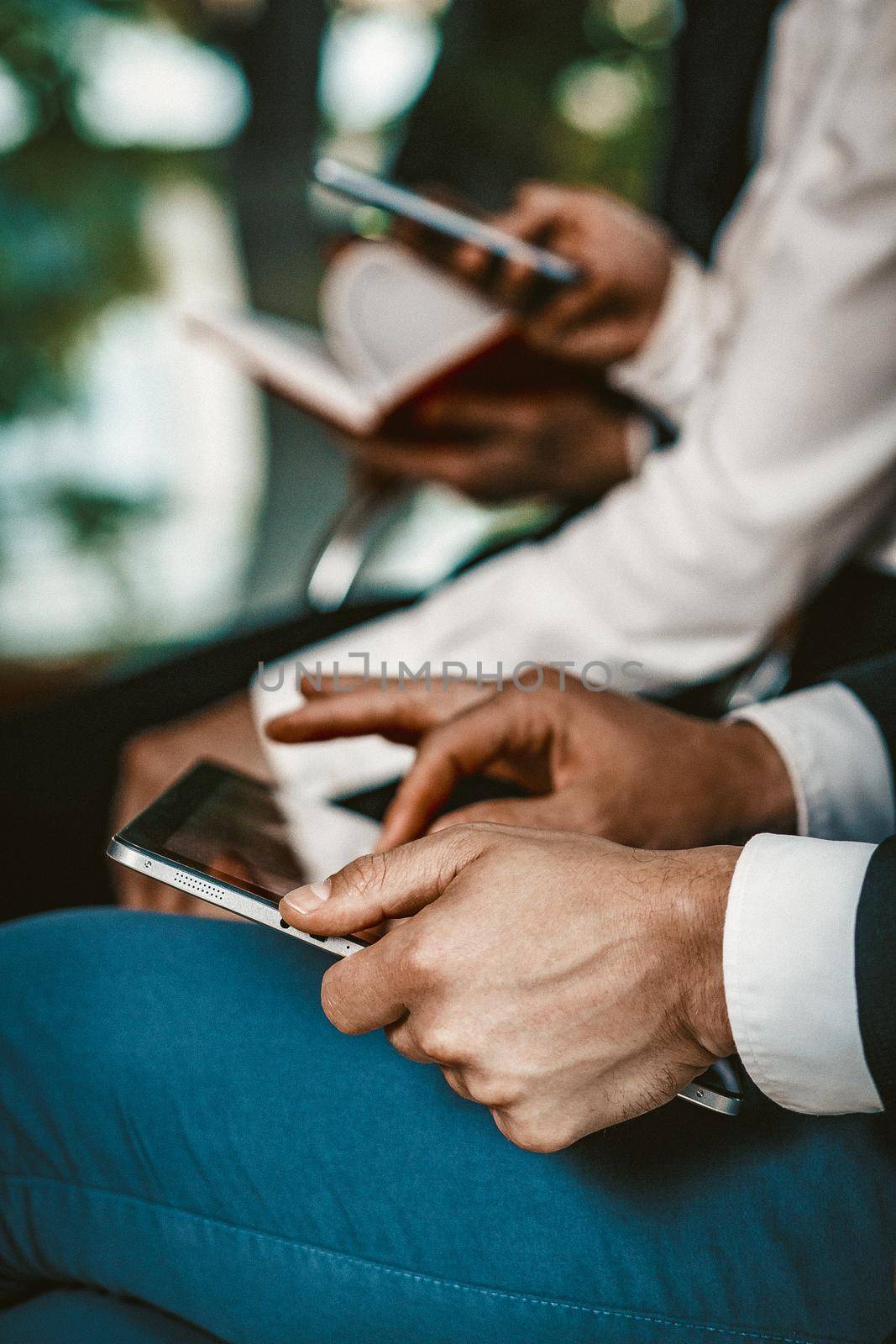 Coworkers Team Are Preparing Before Business Meeting, Selective Focus On Male Hands Making Notes While Using Laptop In Foreground, Close Up Shot, Toned Image