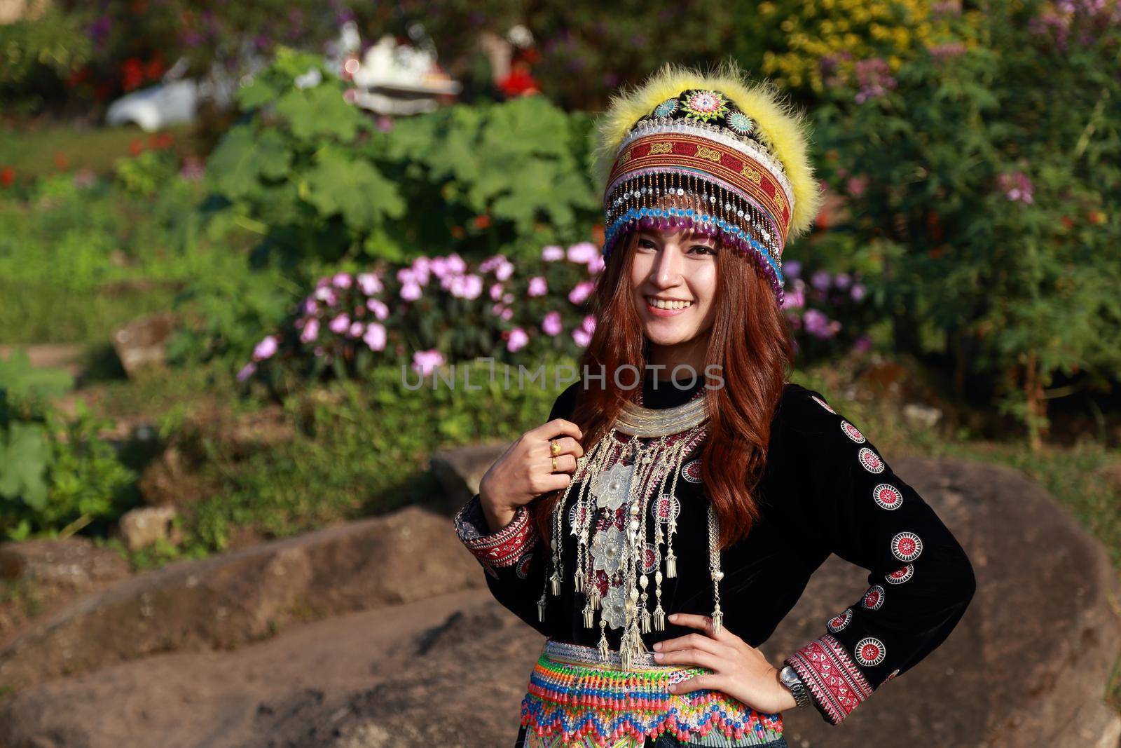 Traditionally dressed Mhong hill tribe woman in the garden at mountain