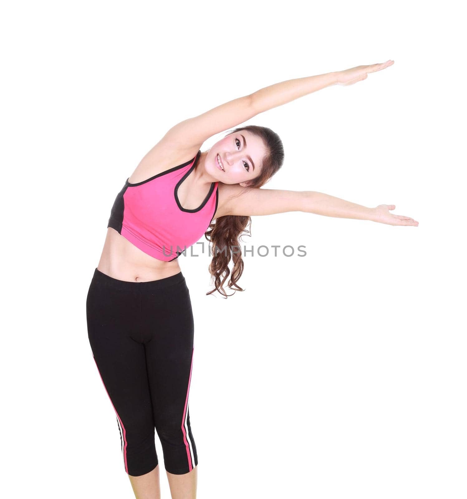 Young woman doing yoga exercise by geargodz