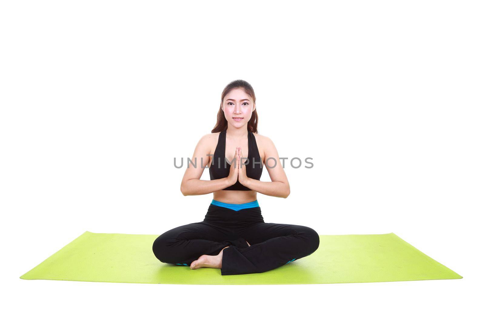 Young woman doing yoga exercise with yoga mat isolated on white background