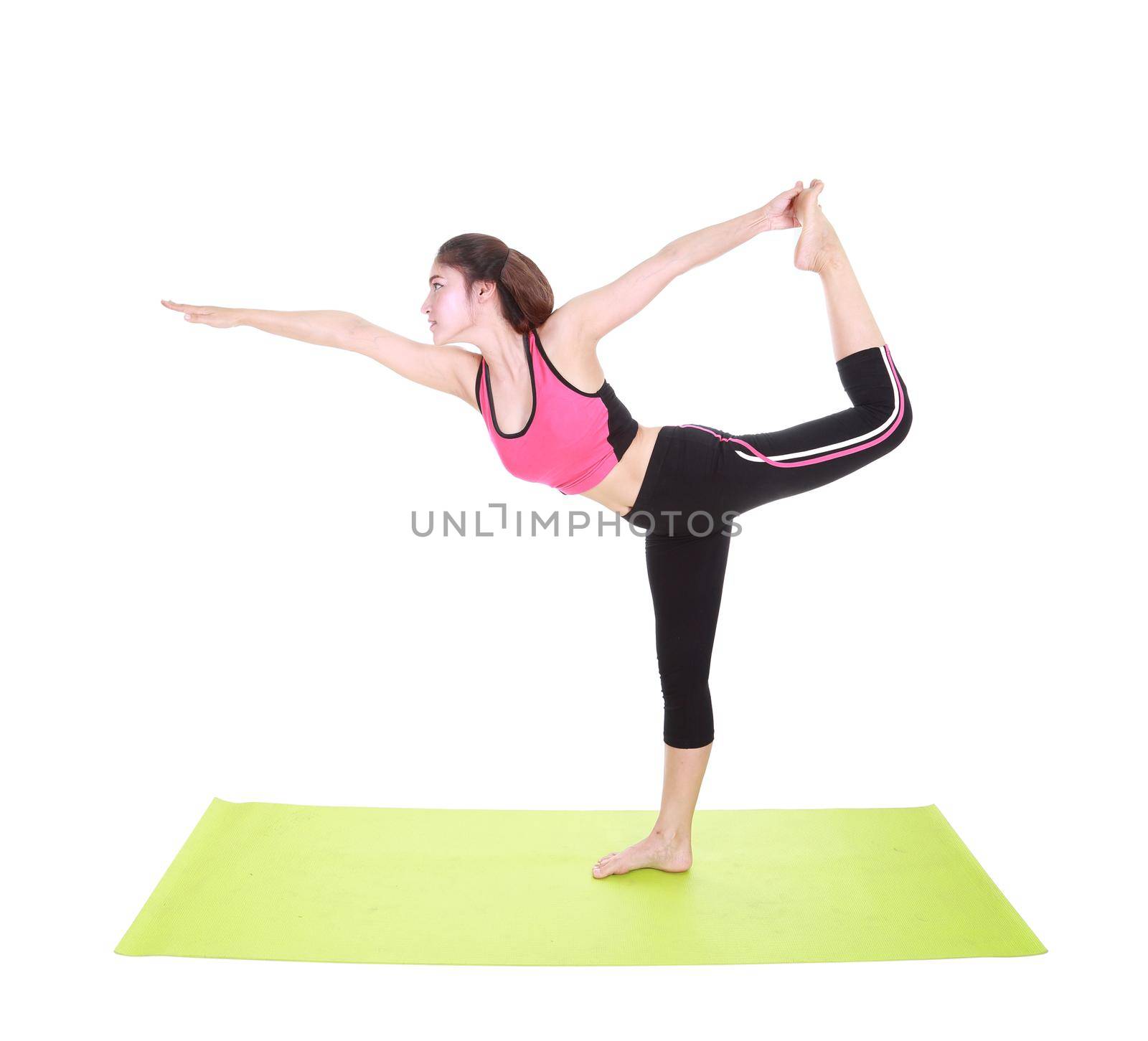 Young woman doing yoga exercise with yoga mat isolated on white background