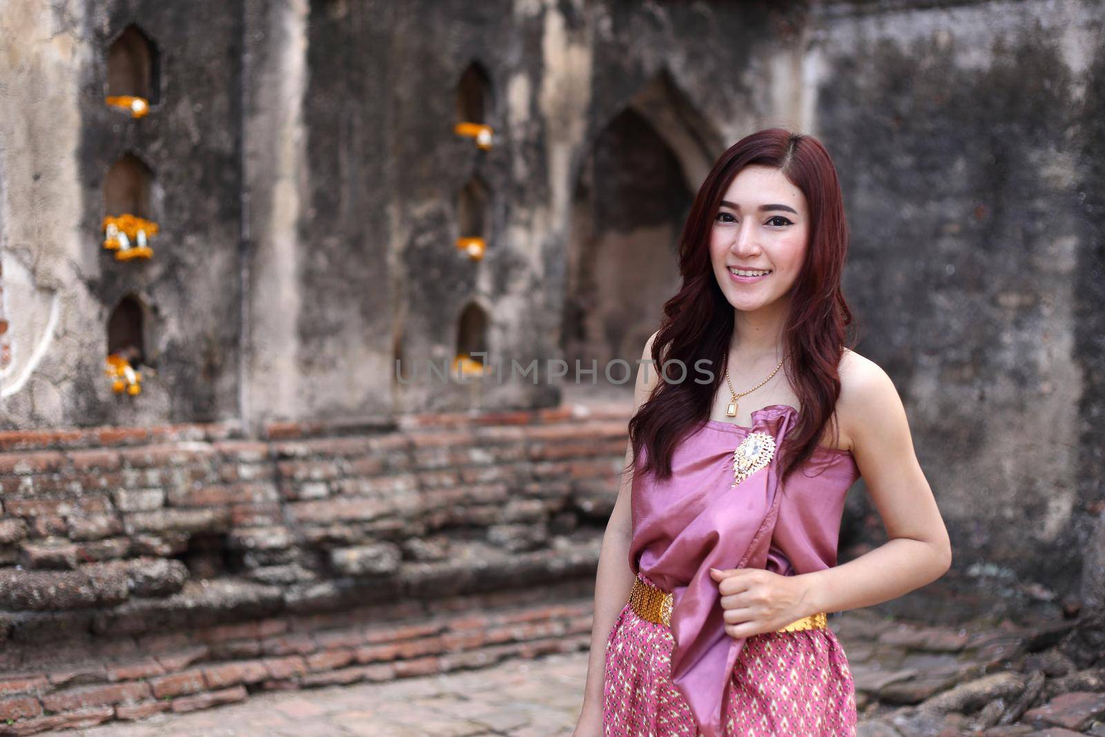 Female in Thai traditional dress at  historical park