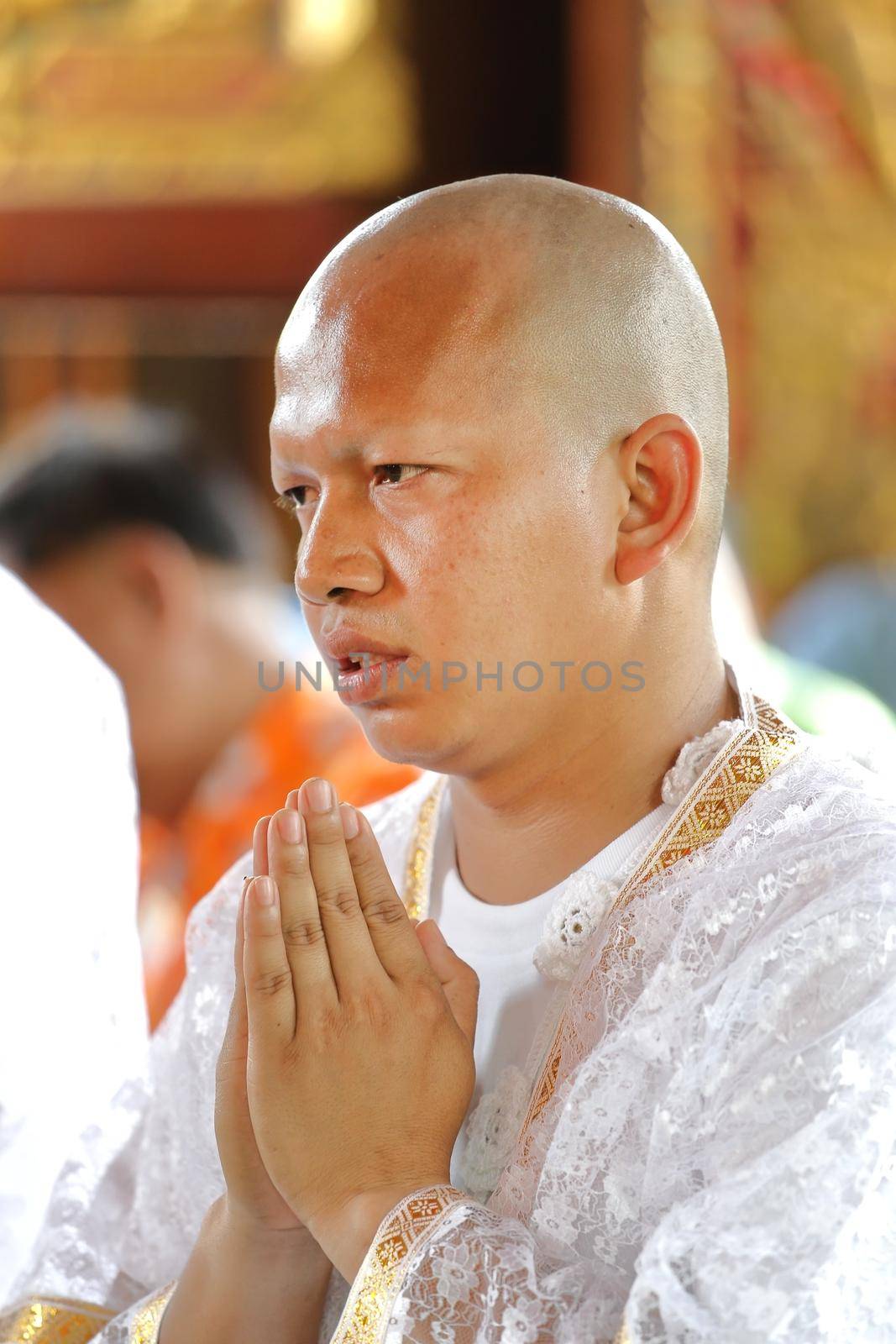 the ordination ceremony that change the Thai young men to be the new monks