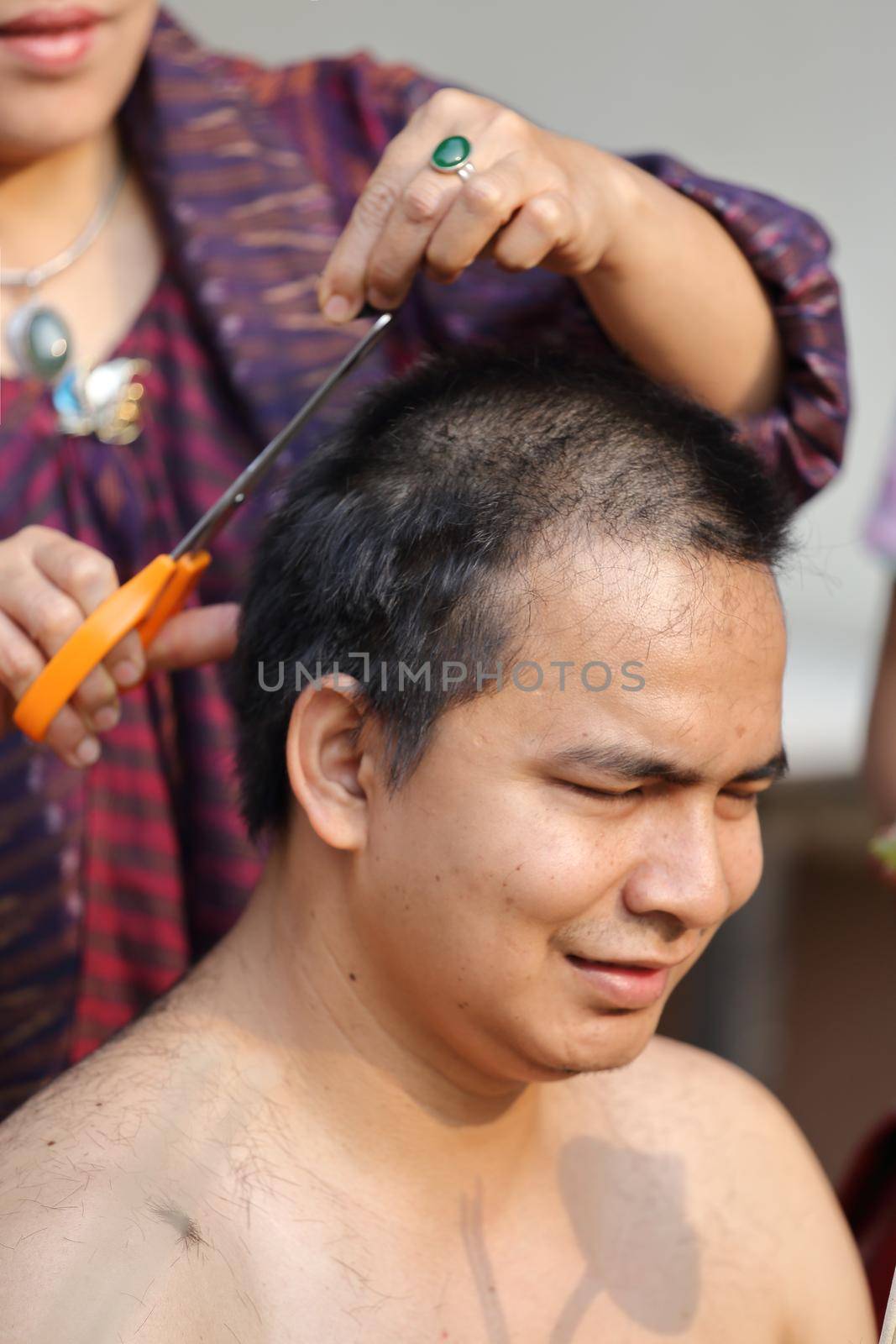 Male who will be monk cut hair for be Ordained to new monk