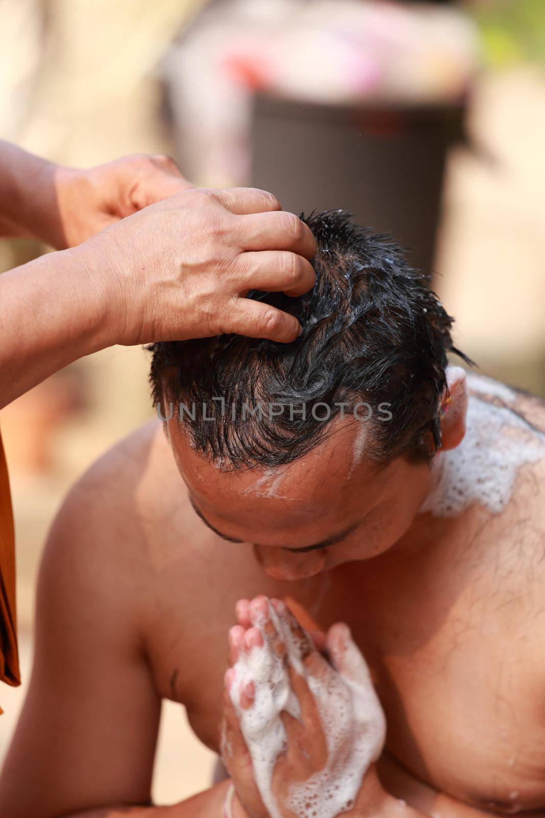 Male who will be monk shaving hair for be Ordained to new monk