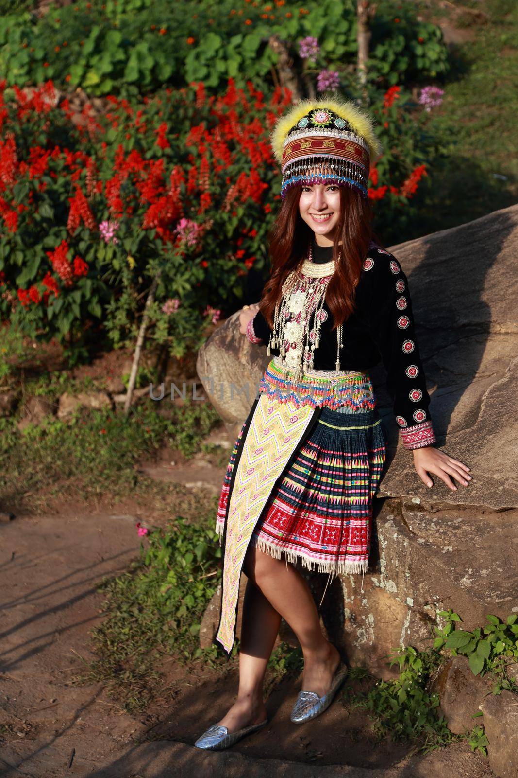 Traditionally dressed Mhong hill tribe woman in the garden at mountain