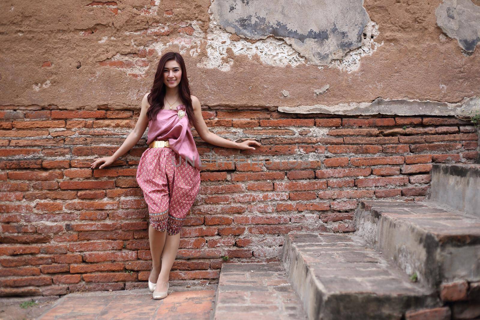 Female in Thai traditional dress at  historical park