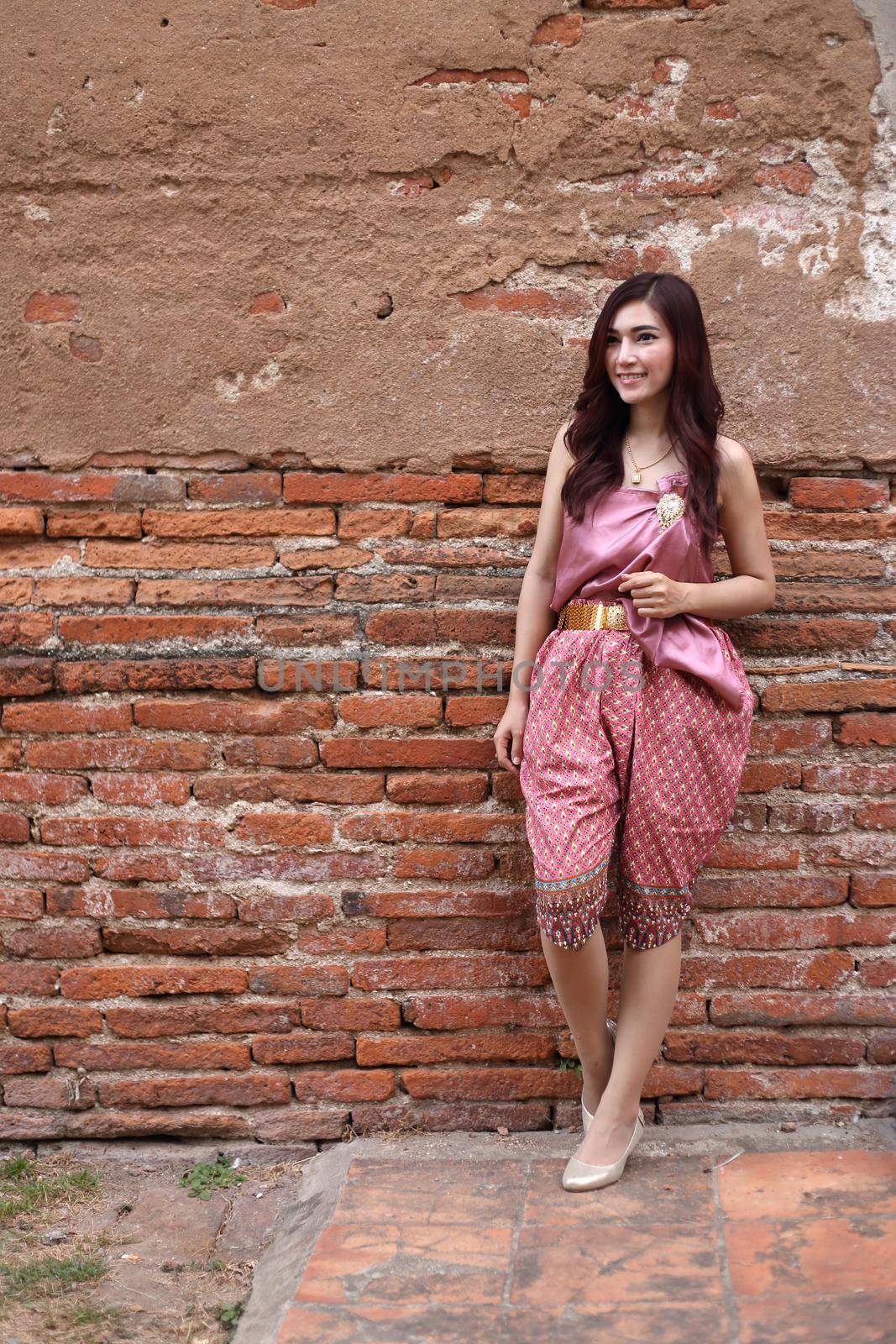 Female in Thai traditional dress at  historical park