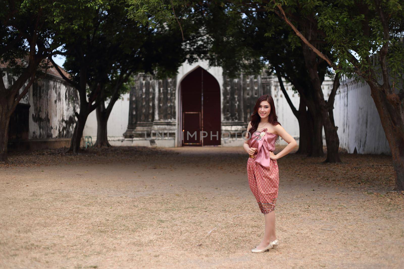 Female in Thai traditional dress at  historical park