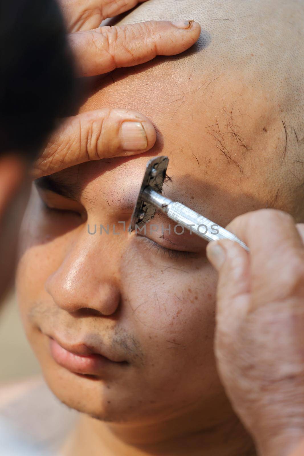 Male who will be monk shaving hair for be Ordained to new monk