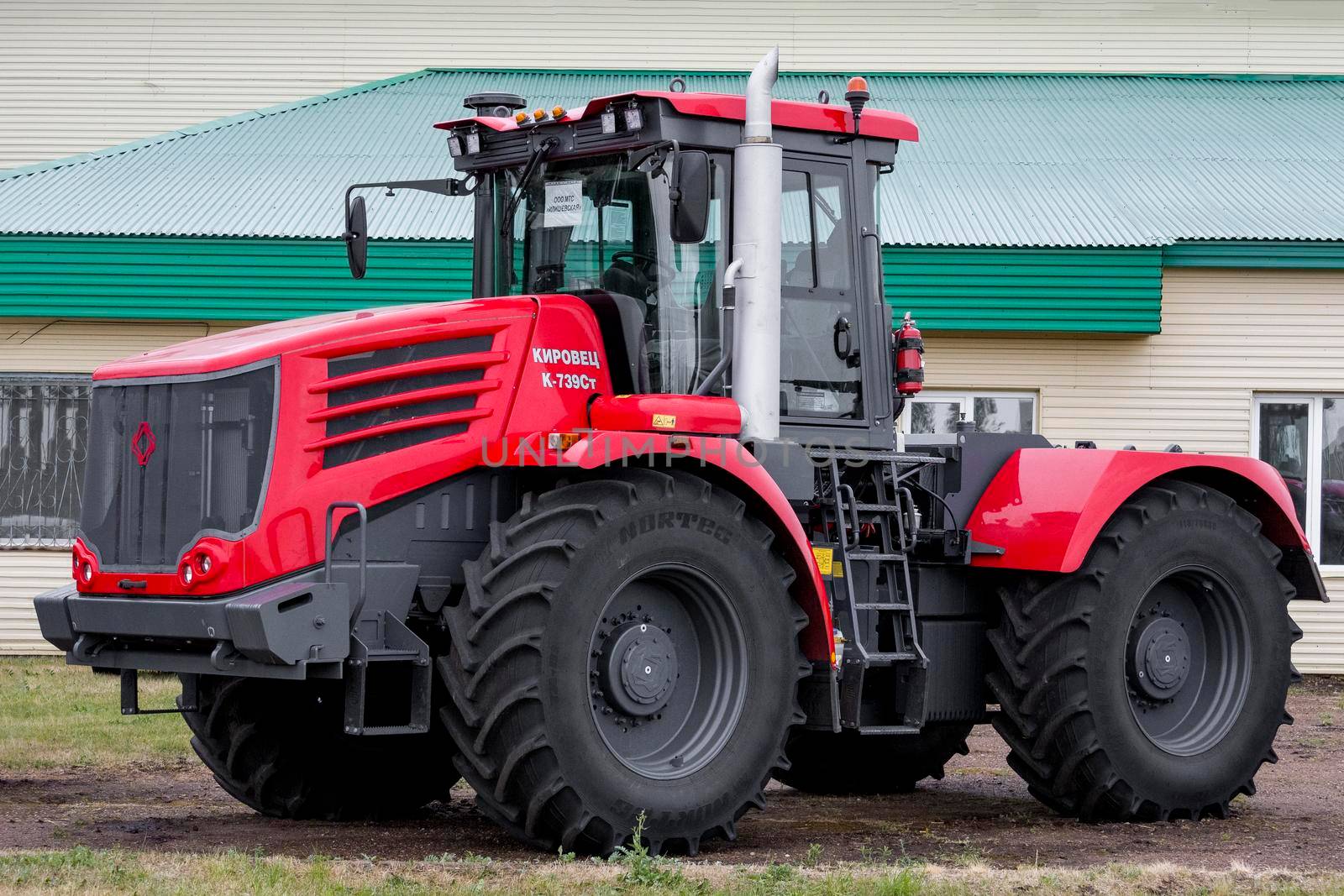 Powerful red tractors brand Kirovets, Bashkortostan, Russia - 19 June, 2022. by Essffes
