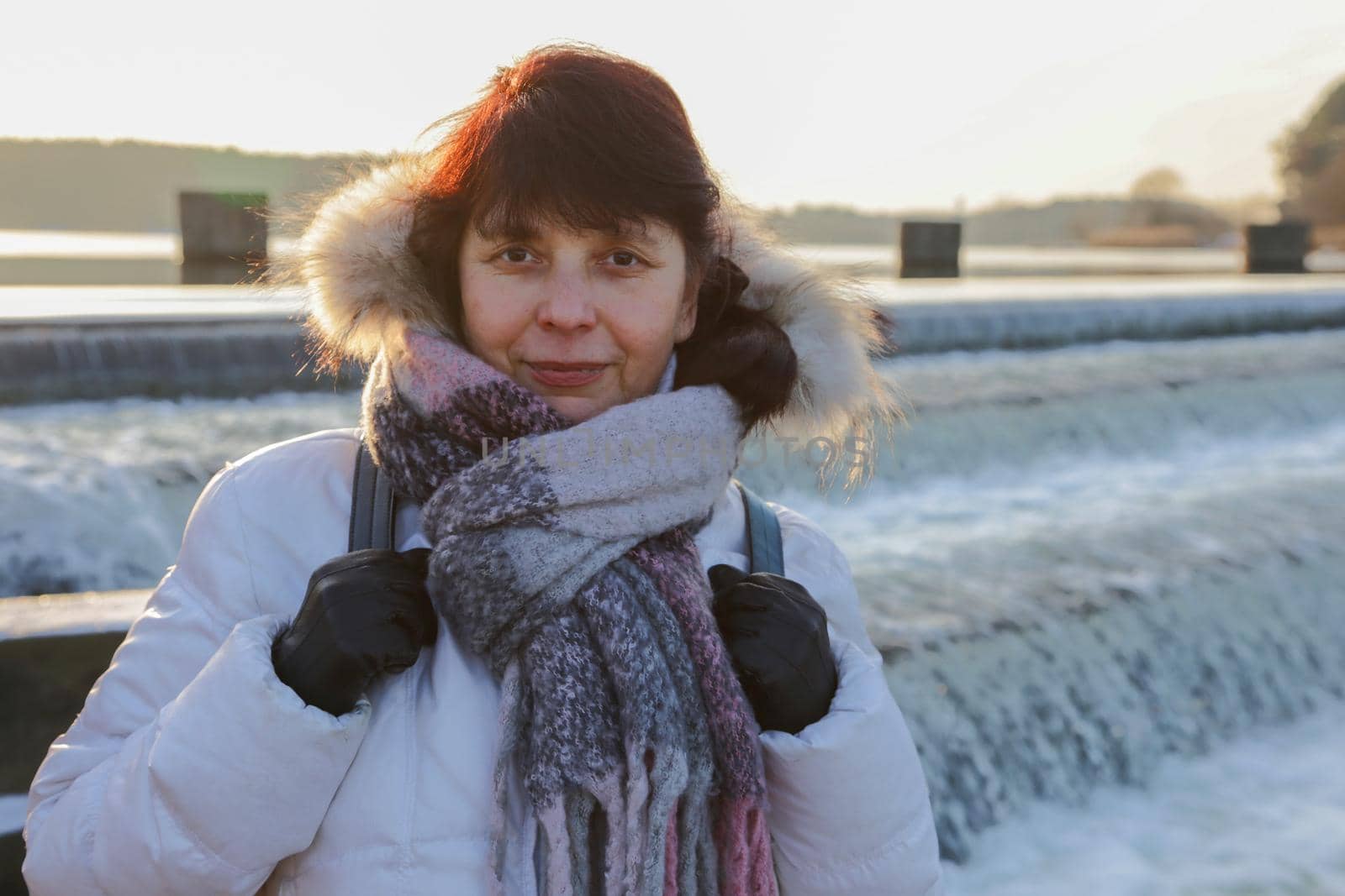 Portrait of a woman against the background of a waterfall. by gelog67