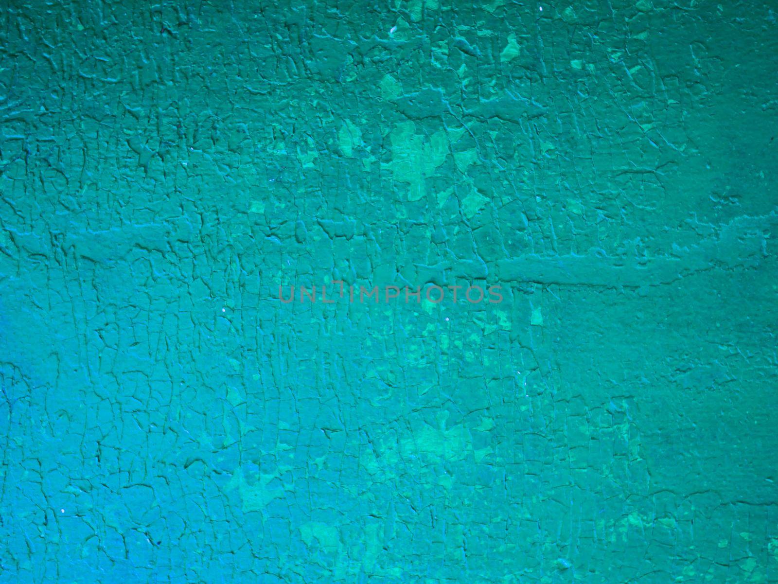 Damaged weathered green background, old with paint worn metal wall surface texture. by gelog67